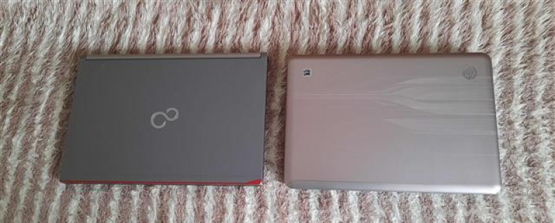 Llaptop 1 HP dhe 1 Fujitsu