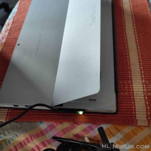 Microsoft Surface tablet dhe laptopa apple
