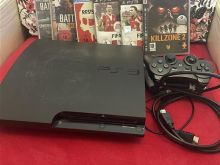 PS3 Slim I kompletuar me dy leva dhe disqe me lojra 
