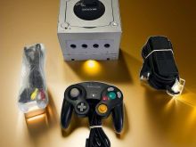 nintendo gamecube me nje kontroller nje kasete loje