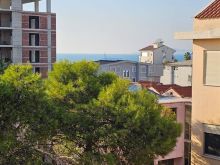 Apartament 1+1+ tarrace me pamje te pjesshme nga deti