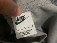Tuta nike tach org