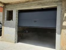 Servis per garazha  dyer dritare  motorra