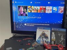 PS4 Slim 1 terabyte me dy leva dhe me lojra te instaluara