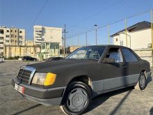 Benz W124 250D pa letra