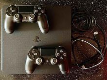PlayStation 4 Slim 1TB + 2 Leva + Lojëra