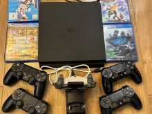 PS4 + 5 Leva + 4 Lojra + Karikues per levat