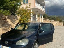 Golf 5  1.6benzine-gaz,viti 2005 ne gjendje shum te mire.