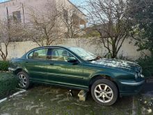 Jaguar x type per pjes kembimi
