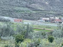 QERA,SHITET ose NDERROHET:Ndertese 300 m2 dhe toke  + 5000m2
