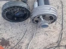 Elektromotorra per porta garazhi 