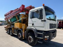 MAN TGA 41 480 with betonpump Putzmeister 31m