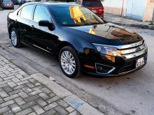 Ford Fusion 2010 American. 4D sedan Hybrid, 2,5L